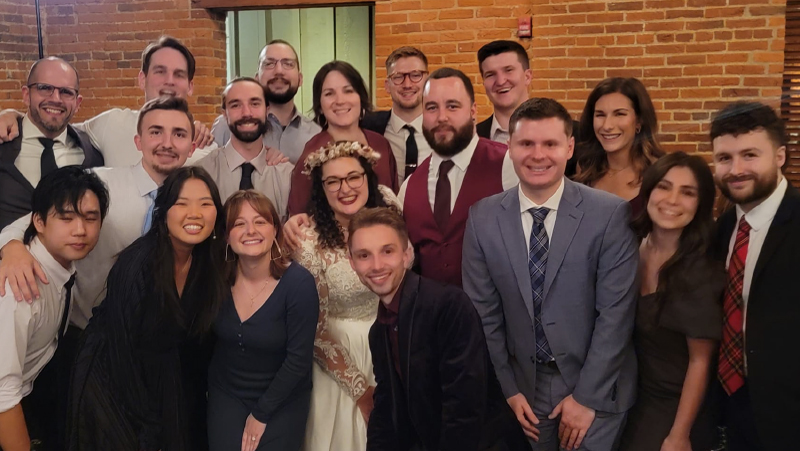 The Coal Crew poses with Sam and Chris at their wedding